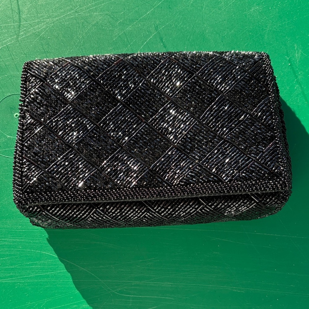 Wall board clutch purse